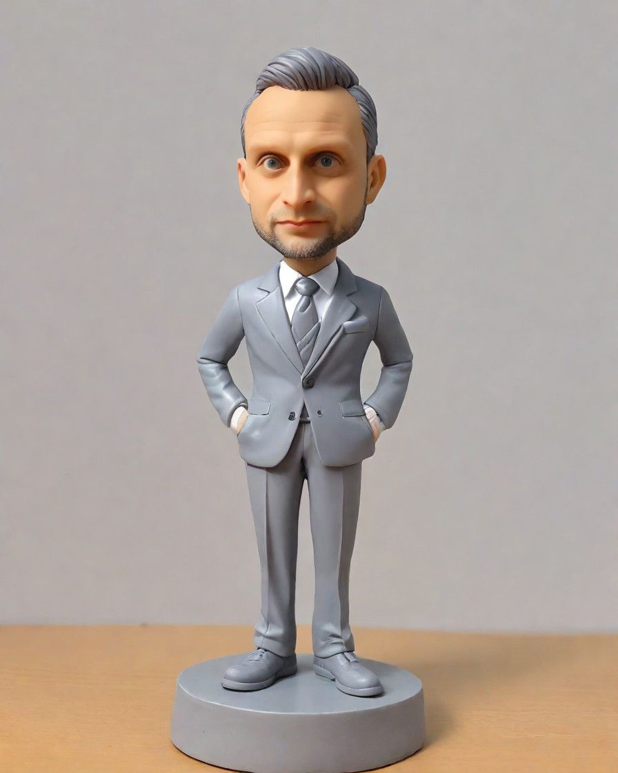 A Mini-Me Masterpiece: How a Gray Suit Figurine Turned My Boss's Day into a Memorable Celebration!